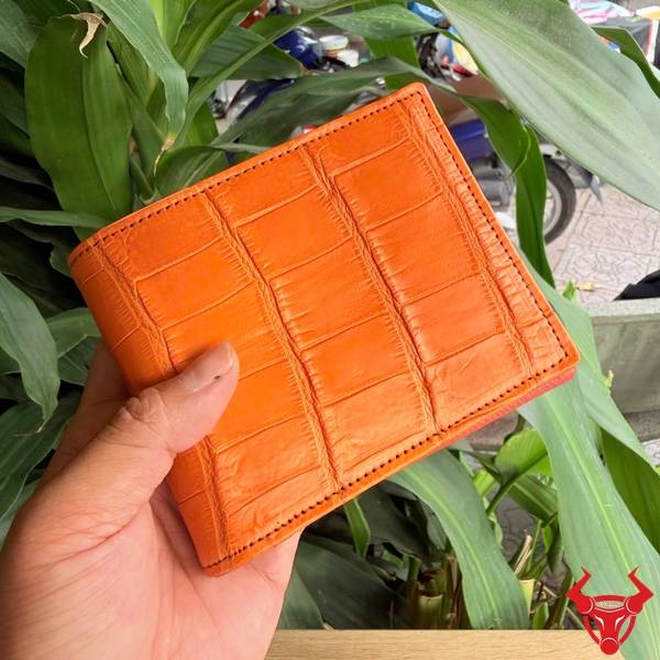 Phụ kiện cao cấp màu cam cá tính, vừa vặn trong tay và có ngăn chứa được bố trí hợp lý.