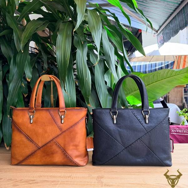 Cặp da bò Vegtan E10 cao cấp, thiết kế thanh lịch, bền đẹp và tiện dụng cho công việc hằng ngày.